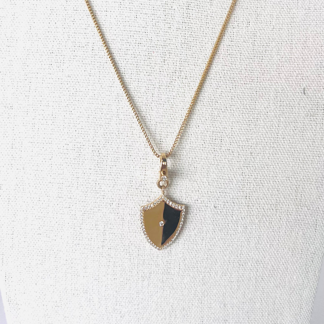 14k gold diamond folded shield pendant with enhancer bail