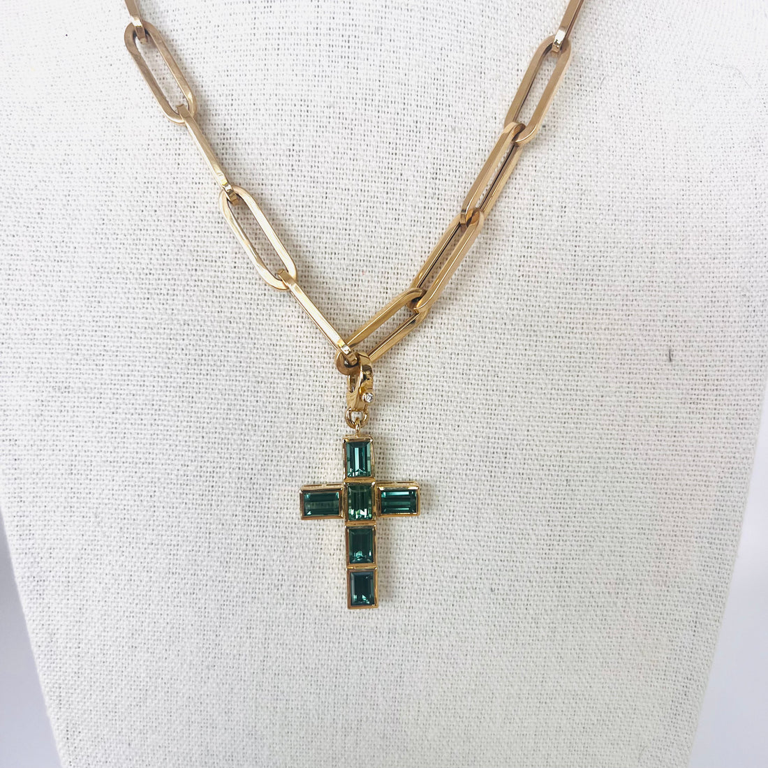 Gorgeous 14k and tourmaline cross pendant with single diamond enhancer bail
