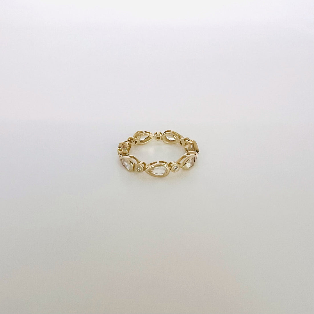 14k round diamond and pear moonstone band