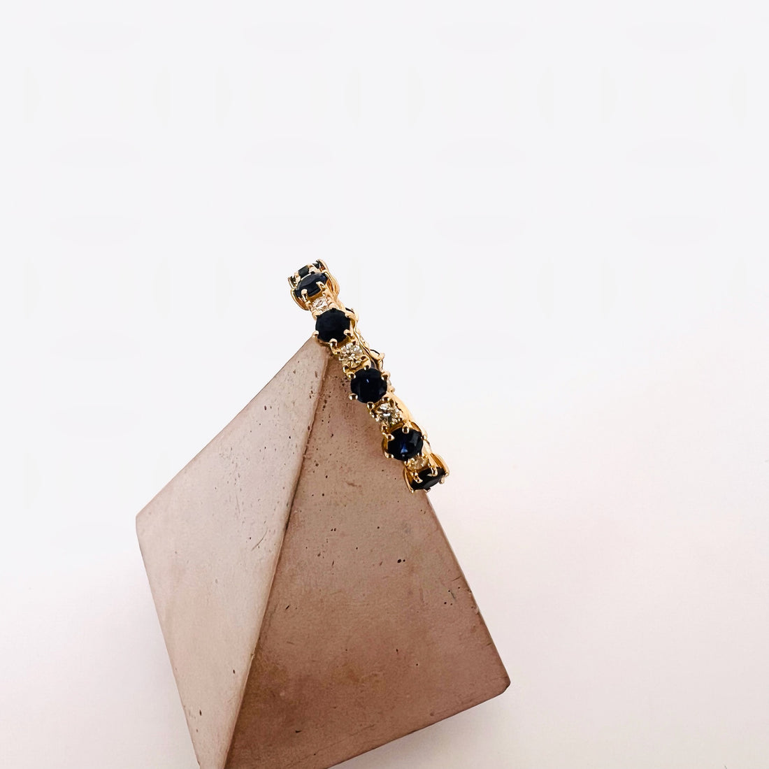 rich blue sapphire and diamond band