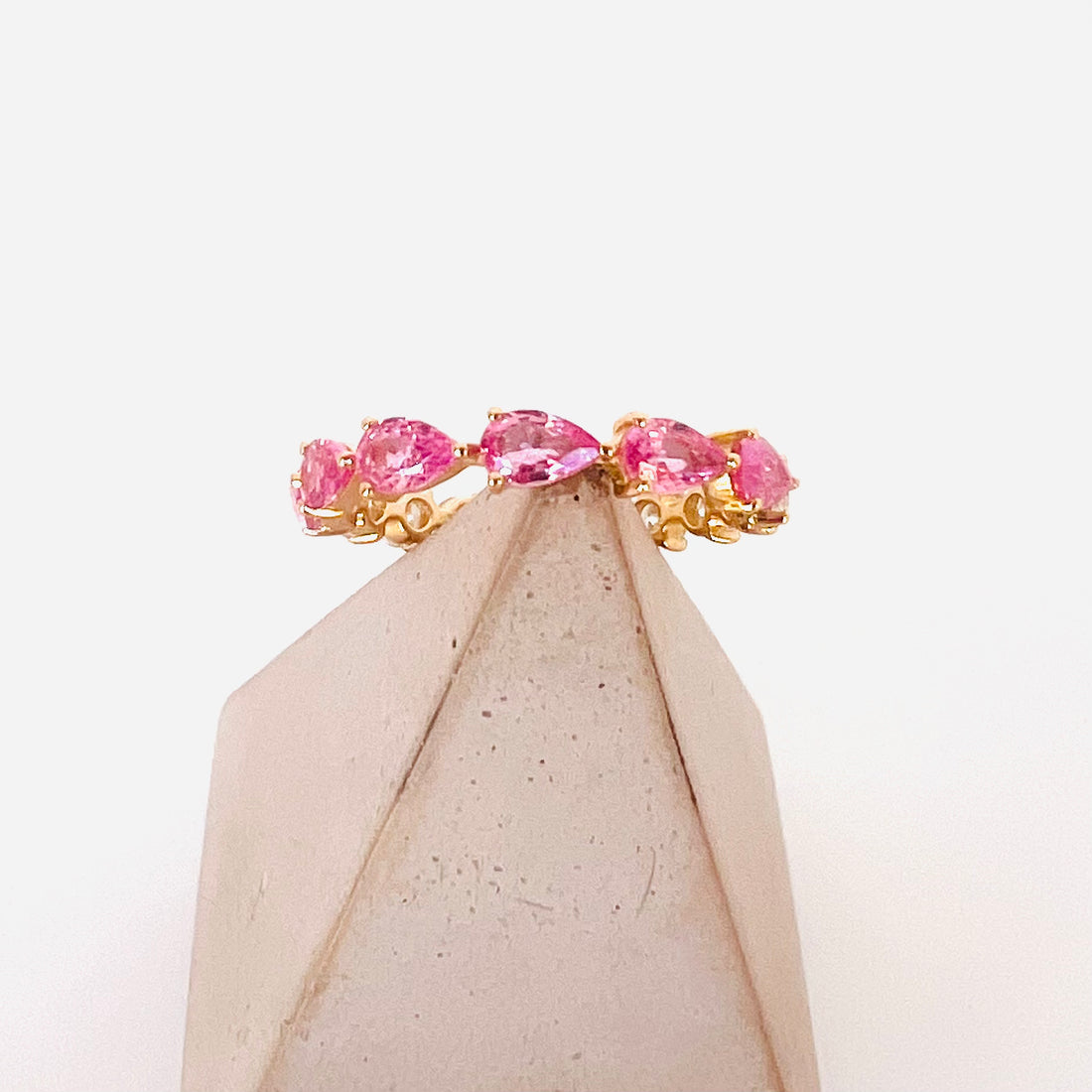 rich pink sapphire and diamond band