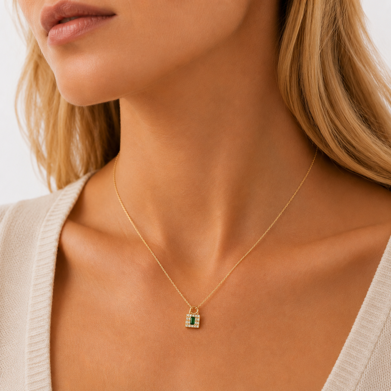 14K gold diamond emerald lock charm, close-up detail