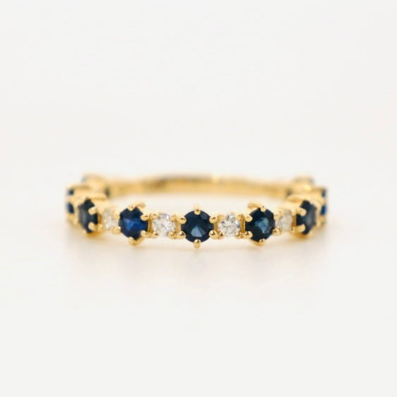 rich blue sapphire and diamond band