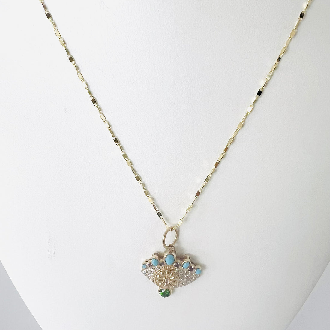 14 k gold with diamond, emerald, amethyst and turquoise evil eye pendant