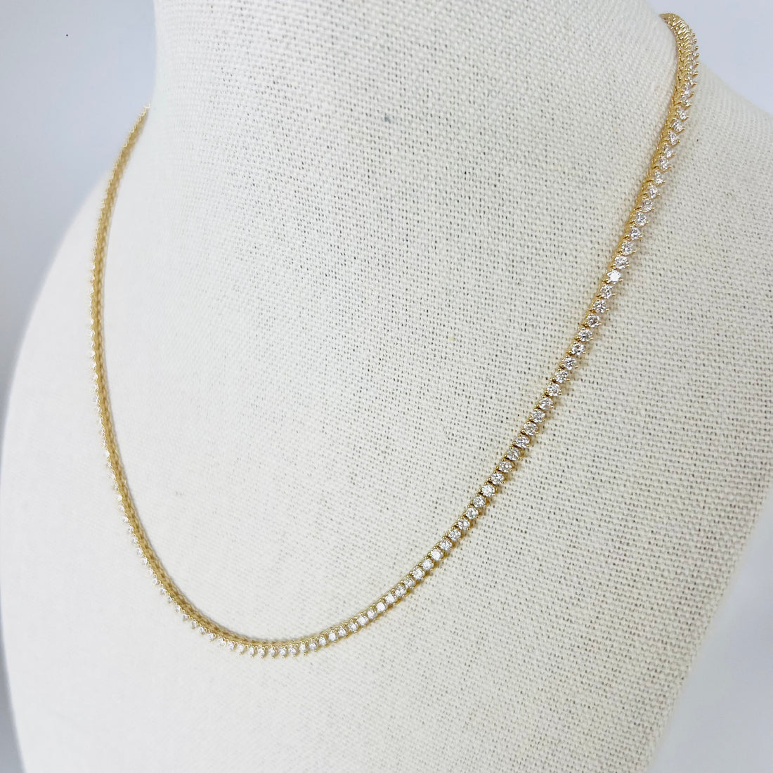 Unique teardrop shaped diamond tennis necklace