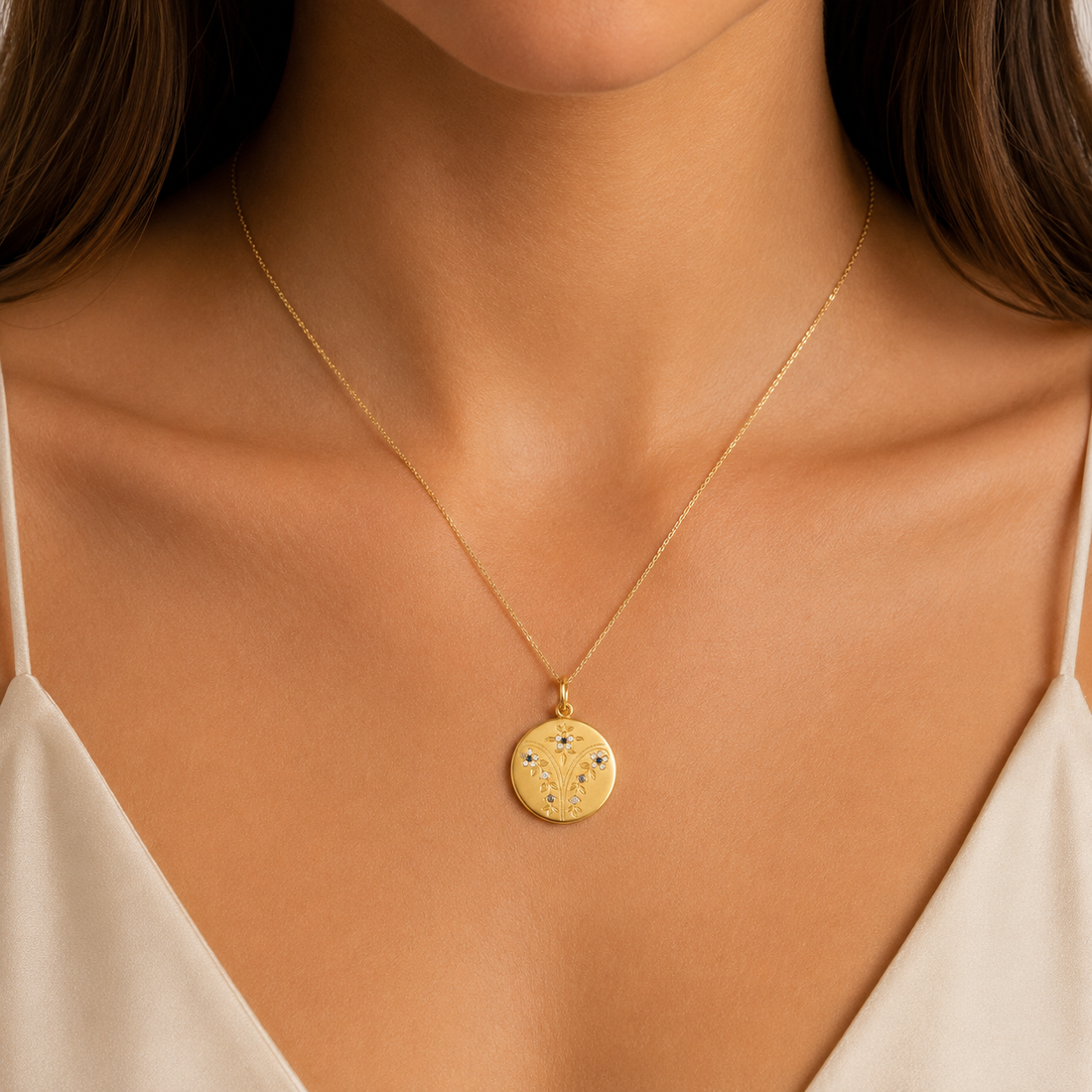 Vintage gold floral locket, close-up detail