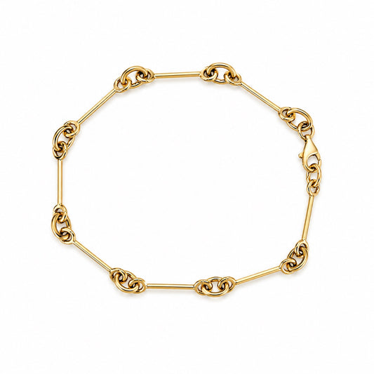 14K gold alternating bar and link bracelet with polished finish