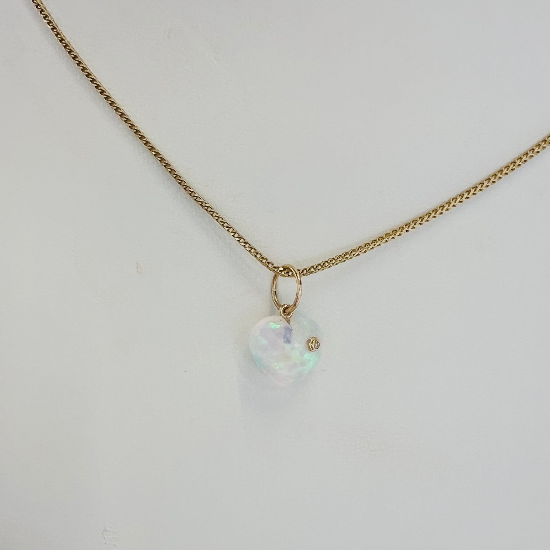 14k gold iridescent puffy heart with single diamond pendant/charm