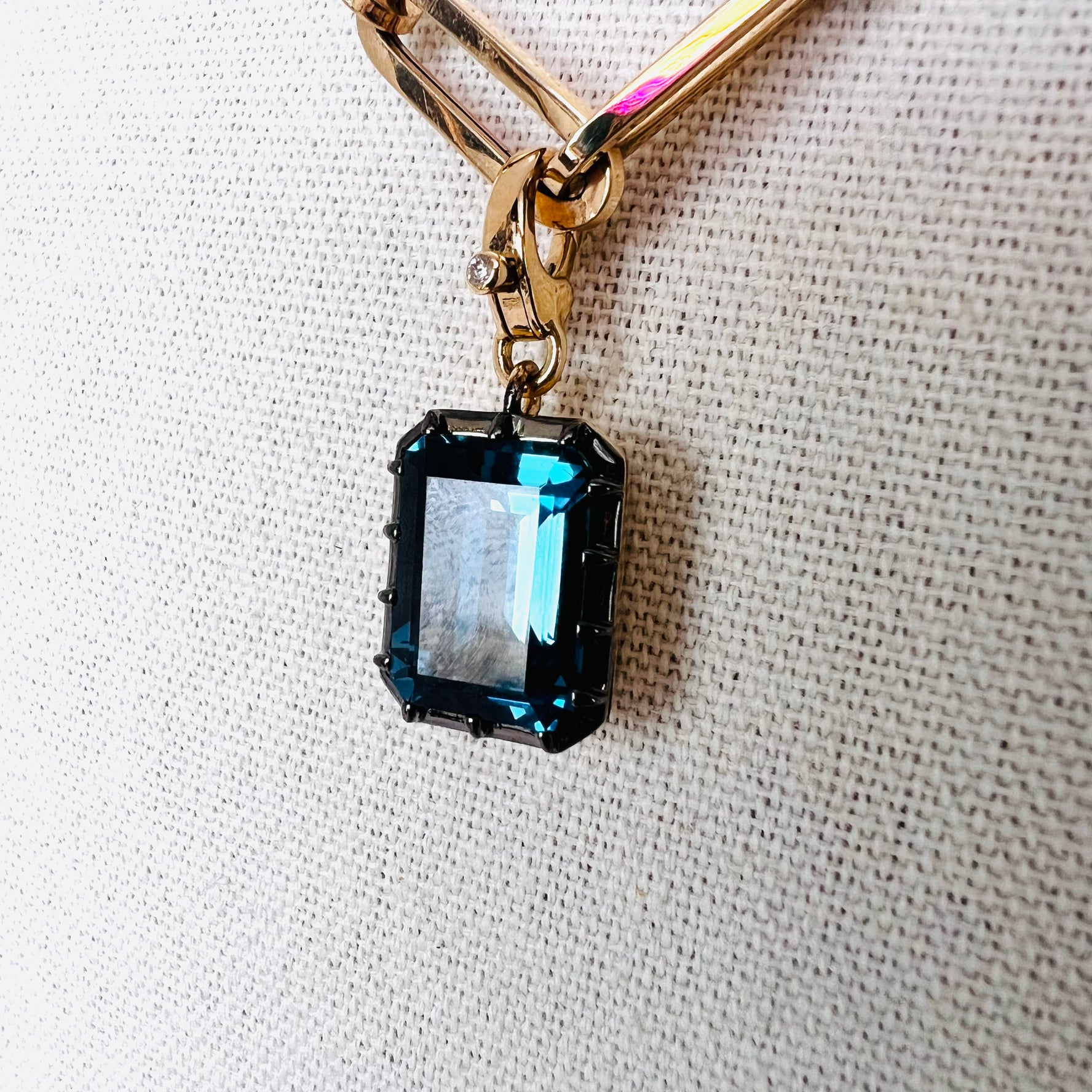 14k London topaz emerald pendant with single diamond enhancer bail