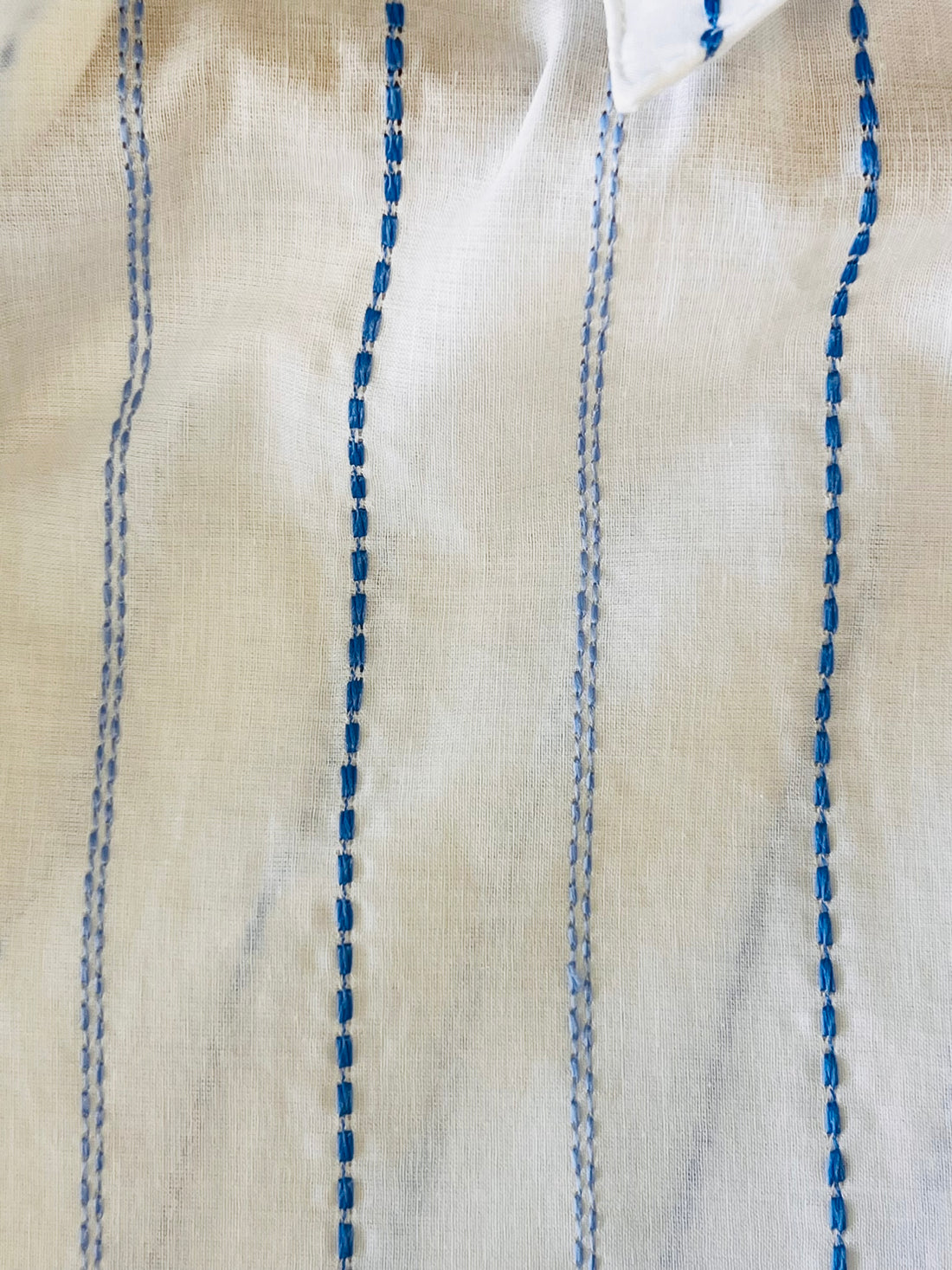 the HATTIE top in vertical blue embroidery
