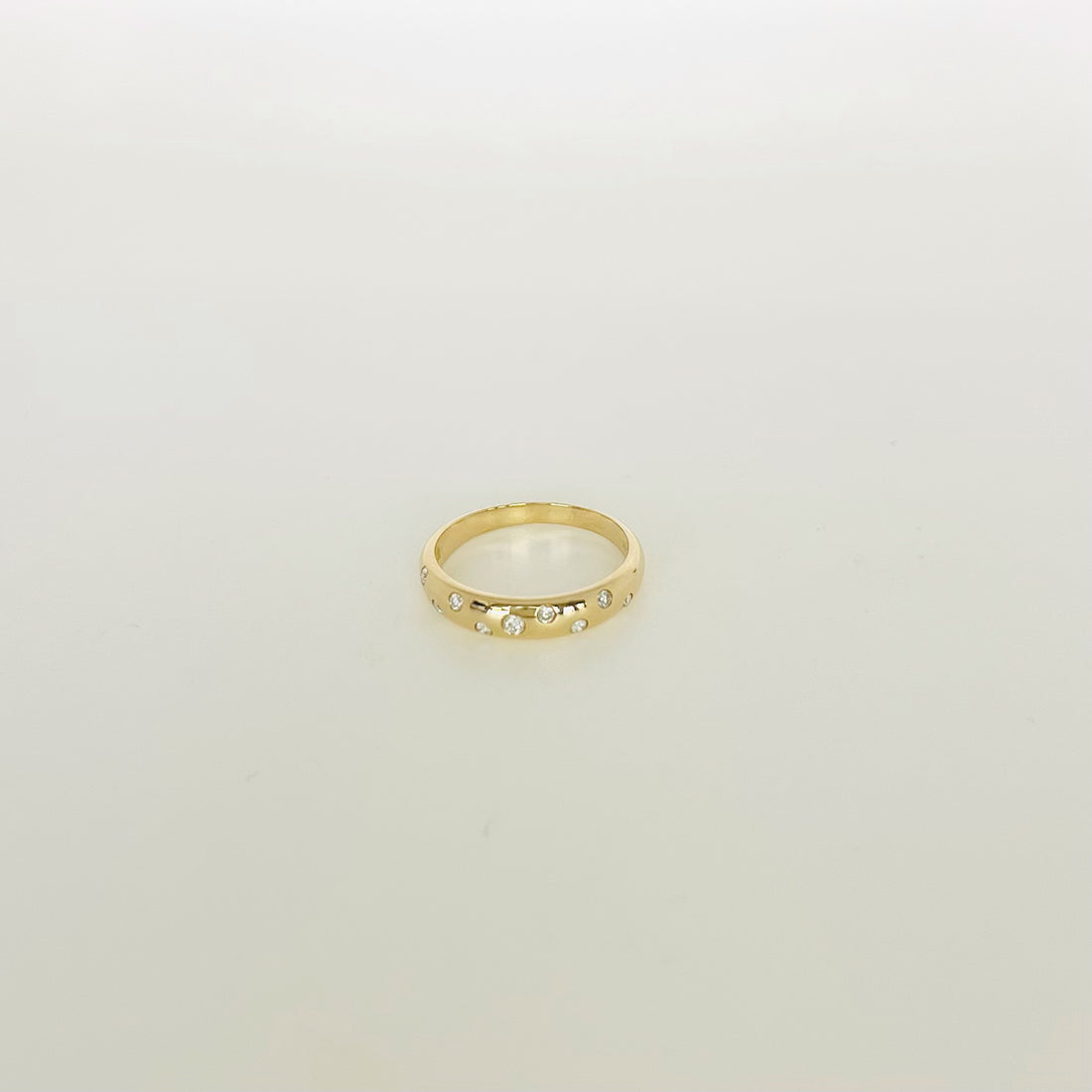 14k gold sprinkled diamond ring