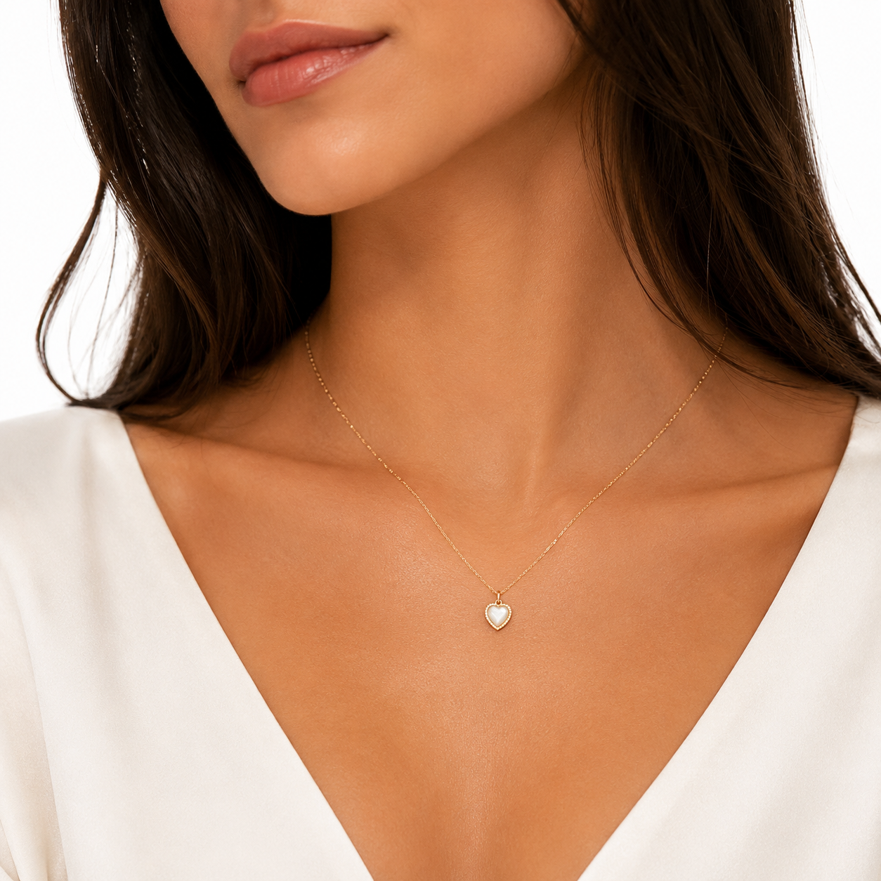14K gold mother of pearl heart charm, close-up detail