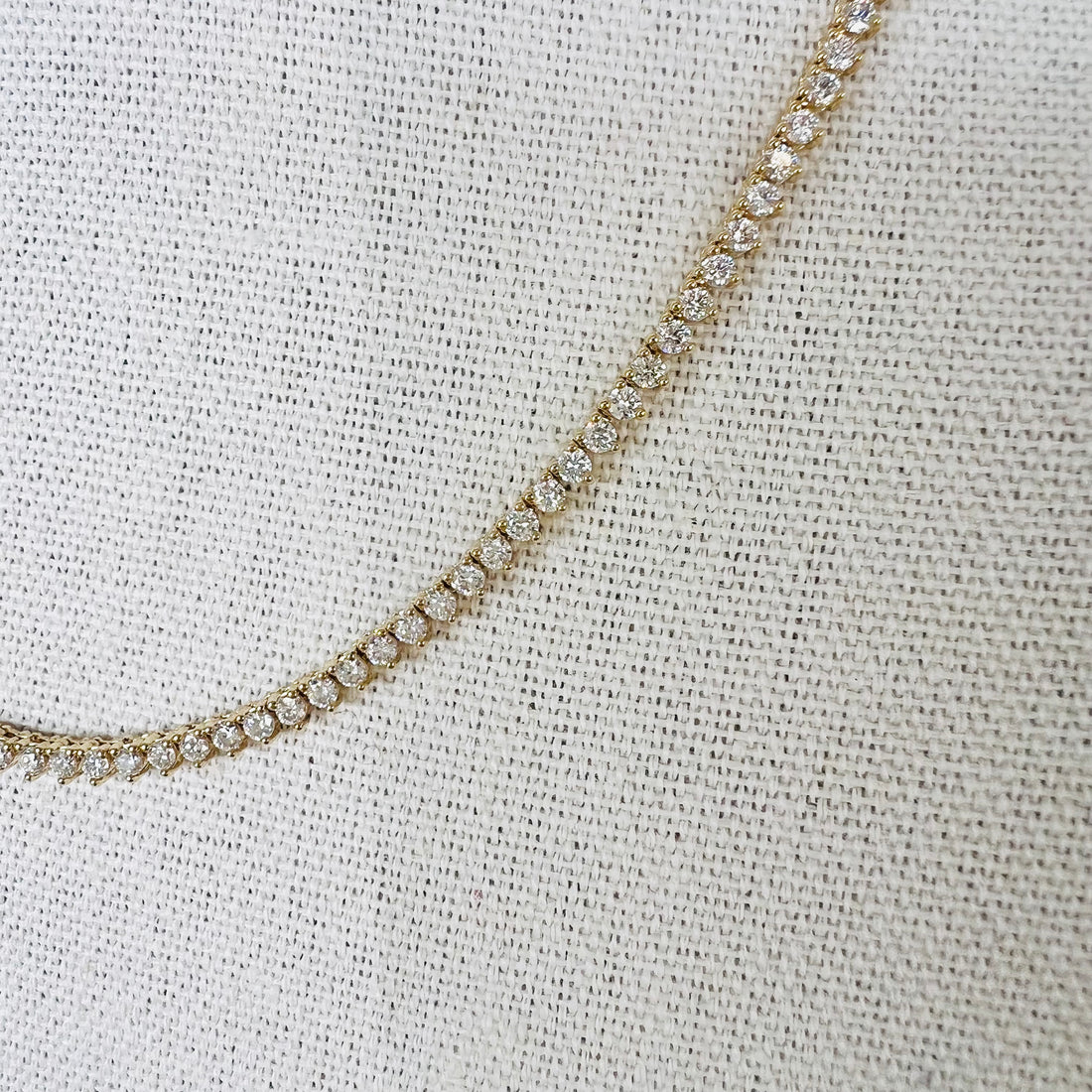 Unique teardrop shaped diamond tennis necklace