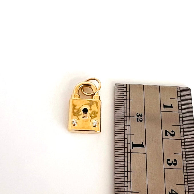 14k gold padlock charm/pendant with two diamonds
