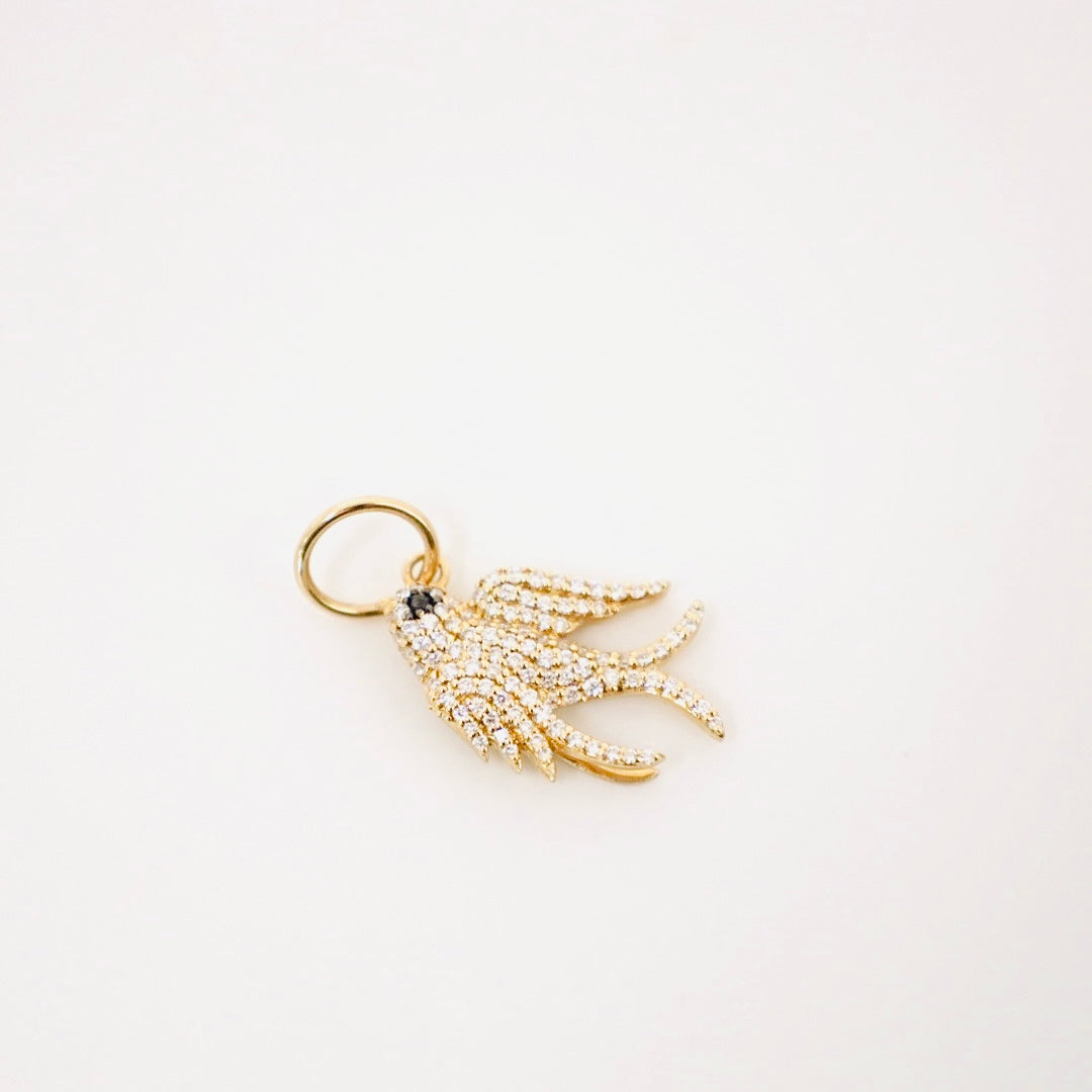 14k gold diamond dove pendant with sapphire eye