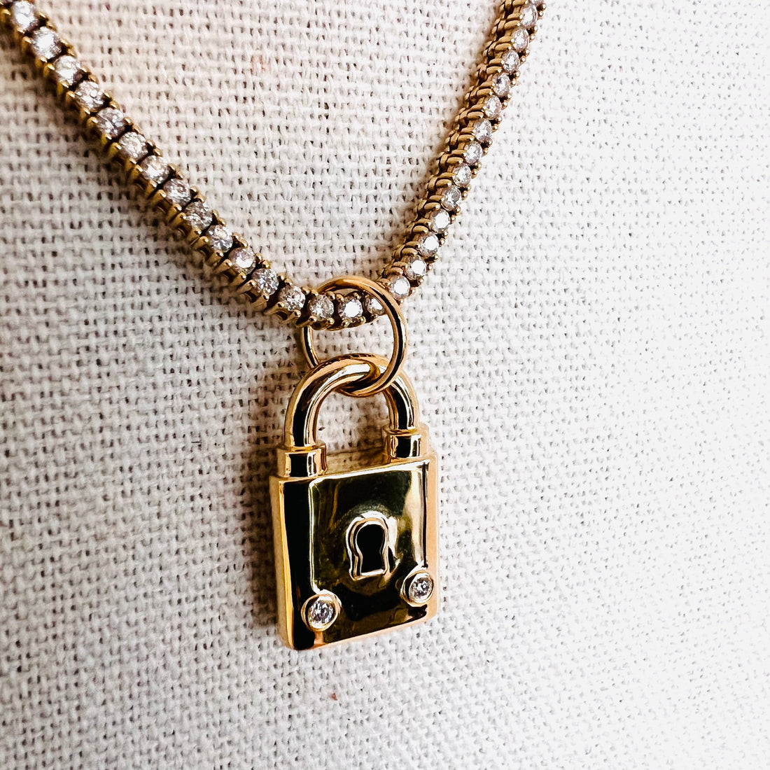 14k gold padlock charm/pendant with two diamonds