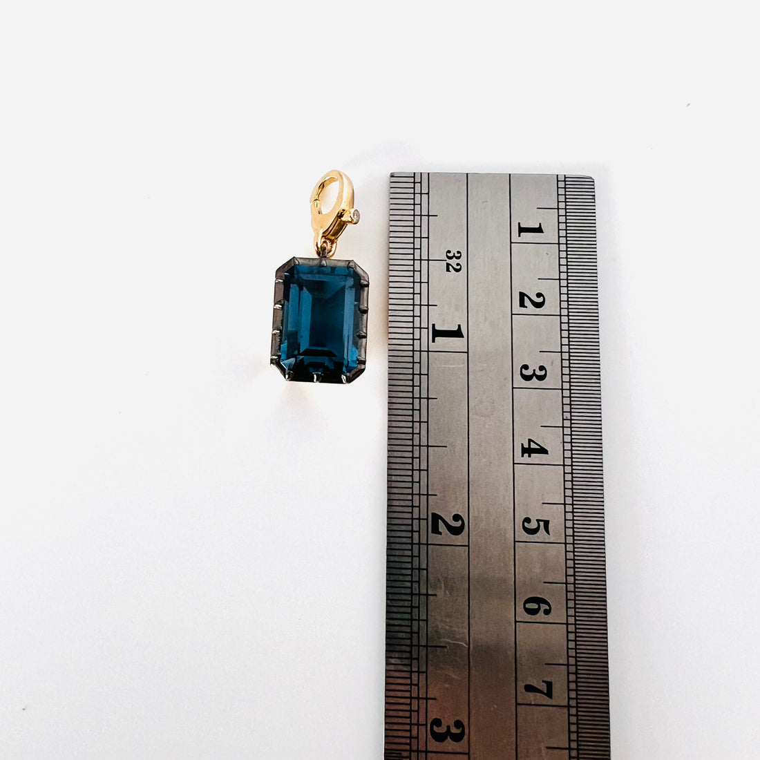 14k London topaz emerald pendant with single diamond enhancer bail