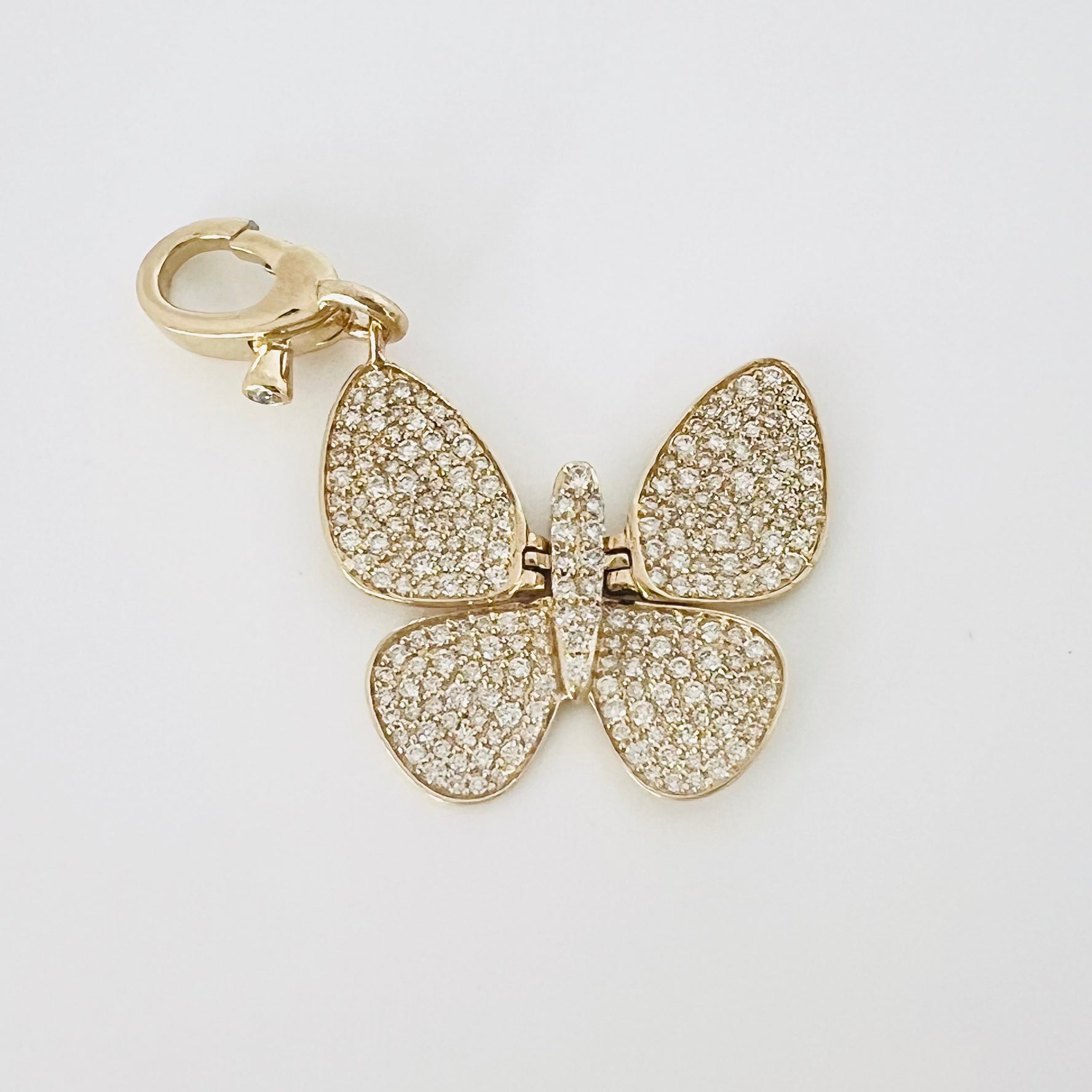 14k gold and solid diamond butterfly pendant