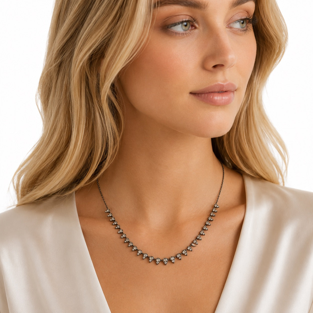 Sterling Silver pear shaped diamond drop tennis necklace