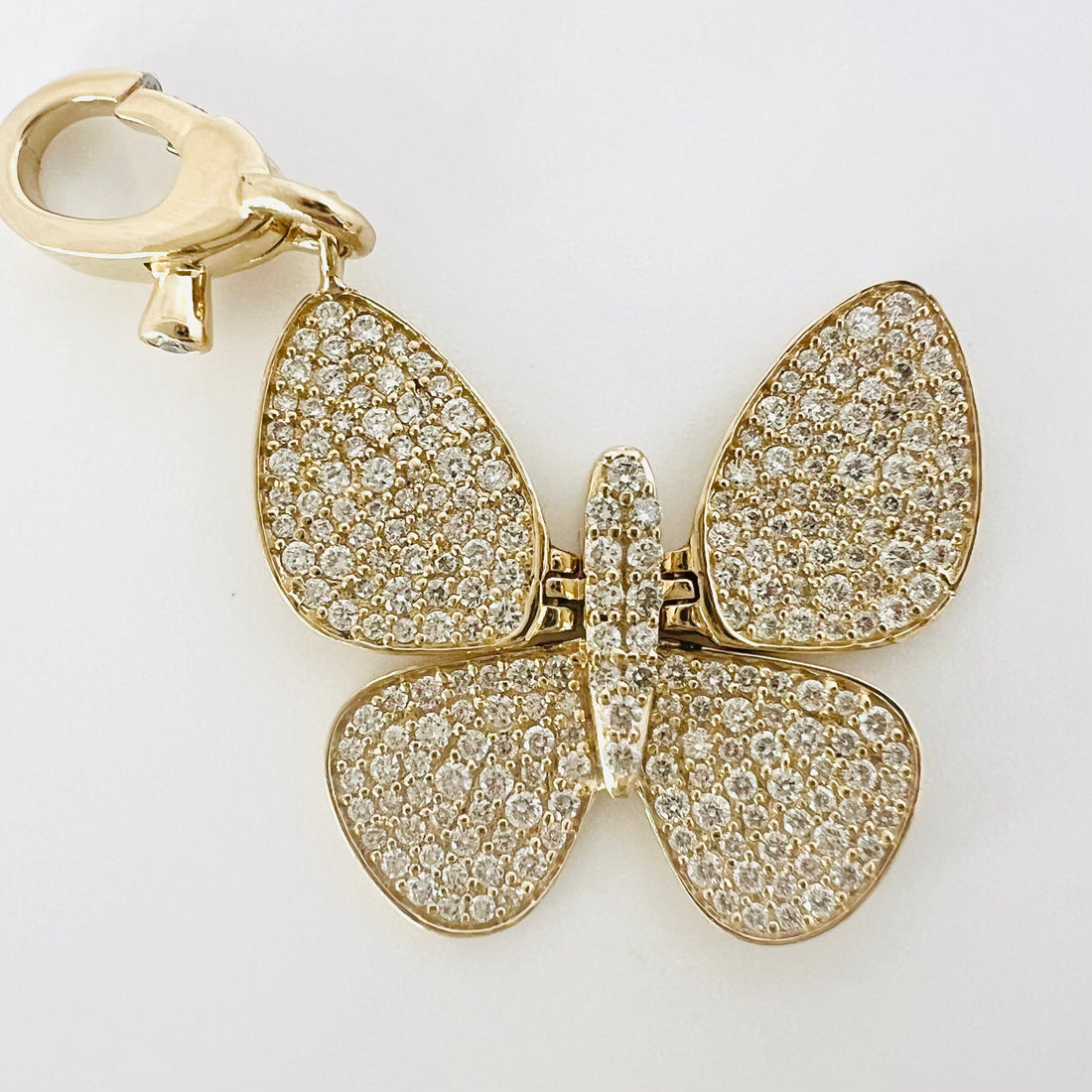 14k gold and solid diamond butterfly pendant