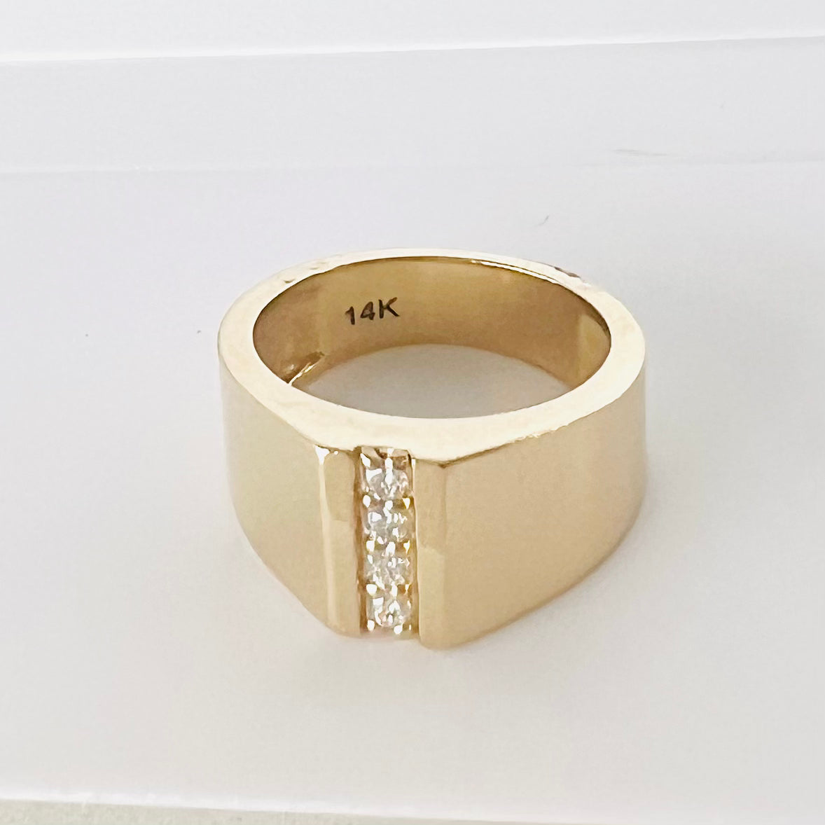 14k gold thick band ring with vertical row of diamonds