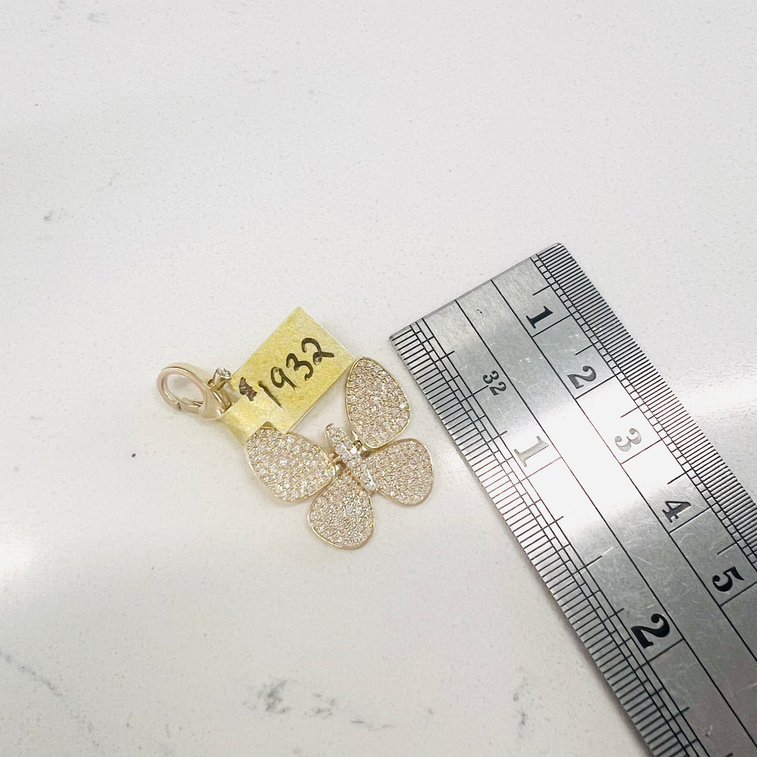 14k gold and solid diamond butterfly pendant