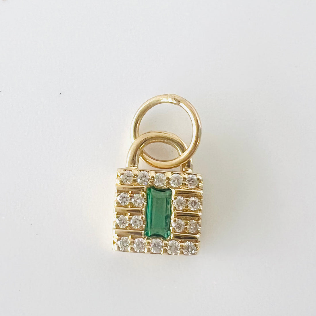 14k gold diamond with emerald lock charm/pendant