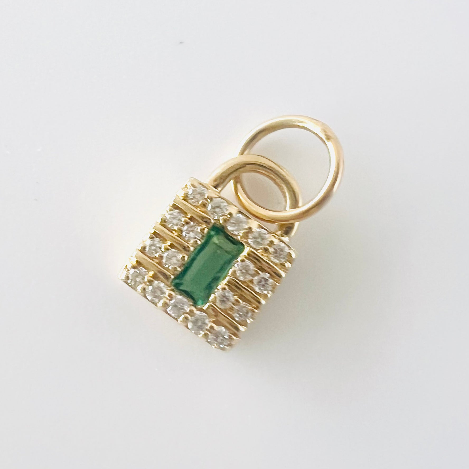 14k gold diamond with emerald lock charm/pendant