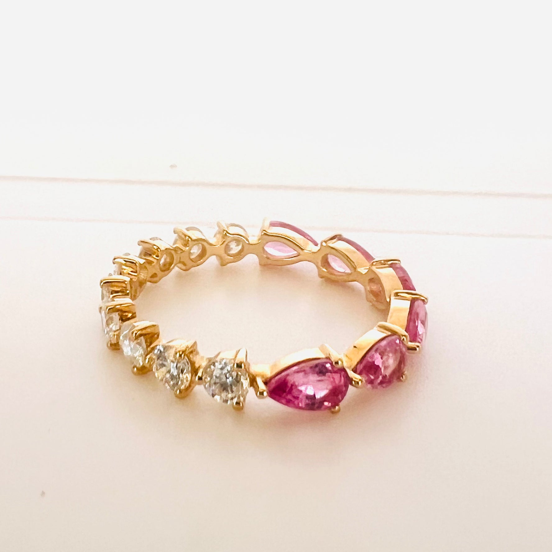 rich pink sapphire and diamond band