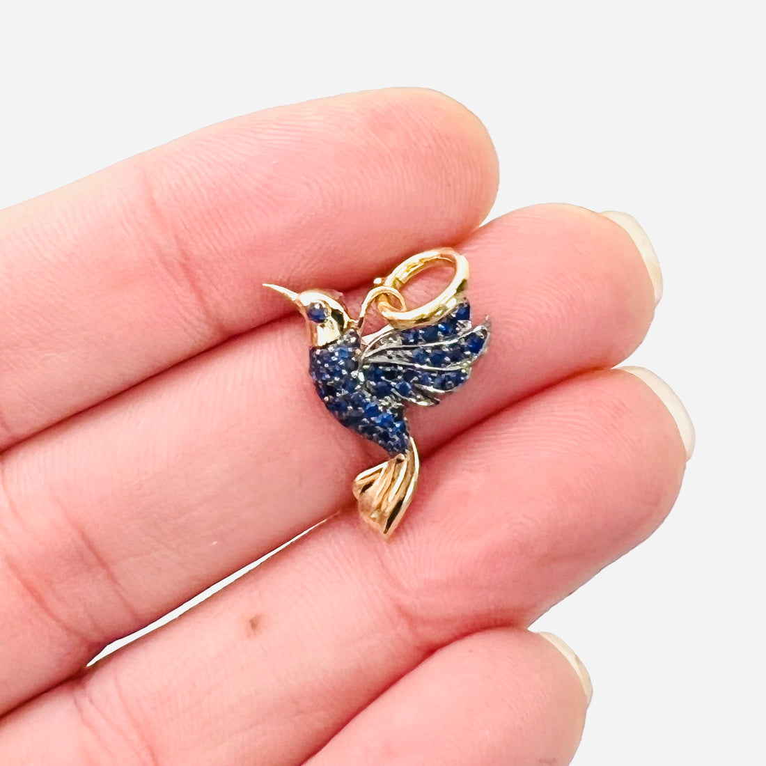 blue sapphire bird charm