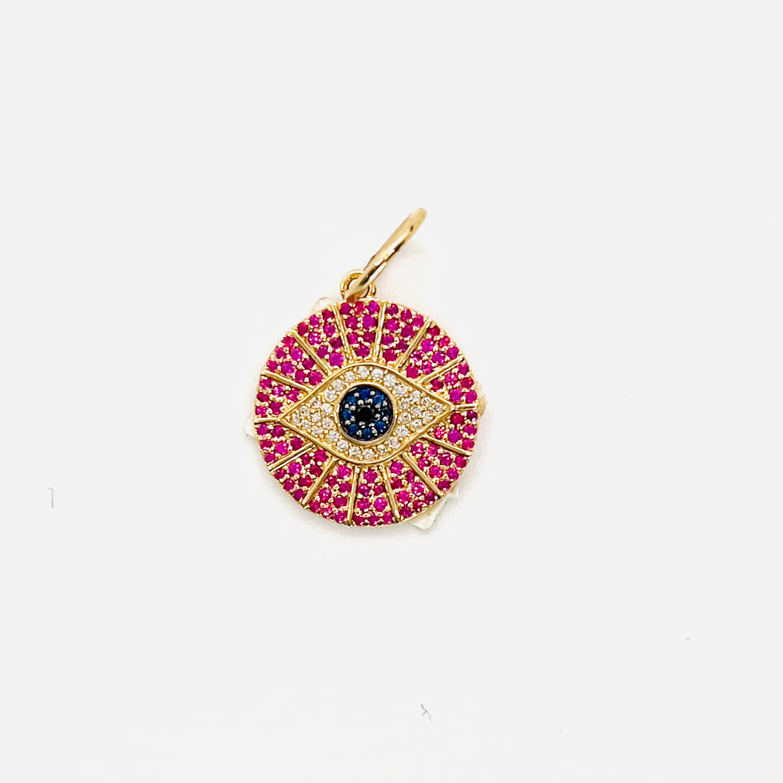 Evil eye pink sapphire and diamond charm