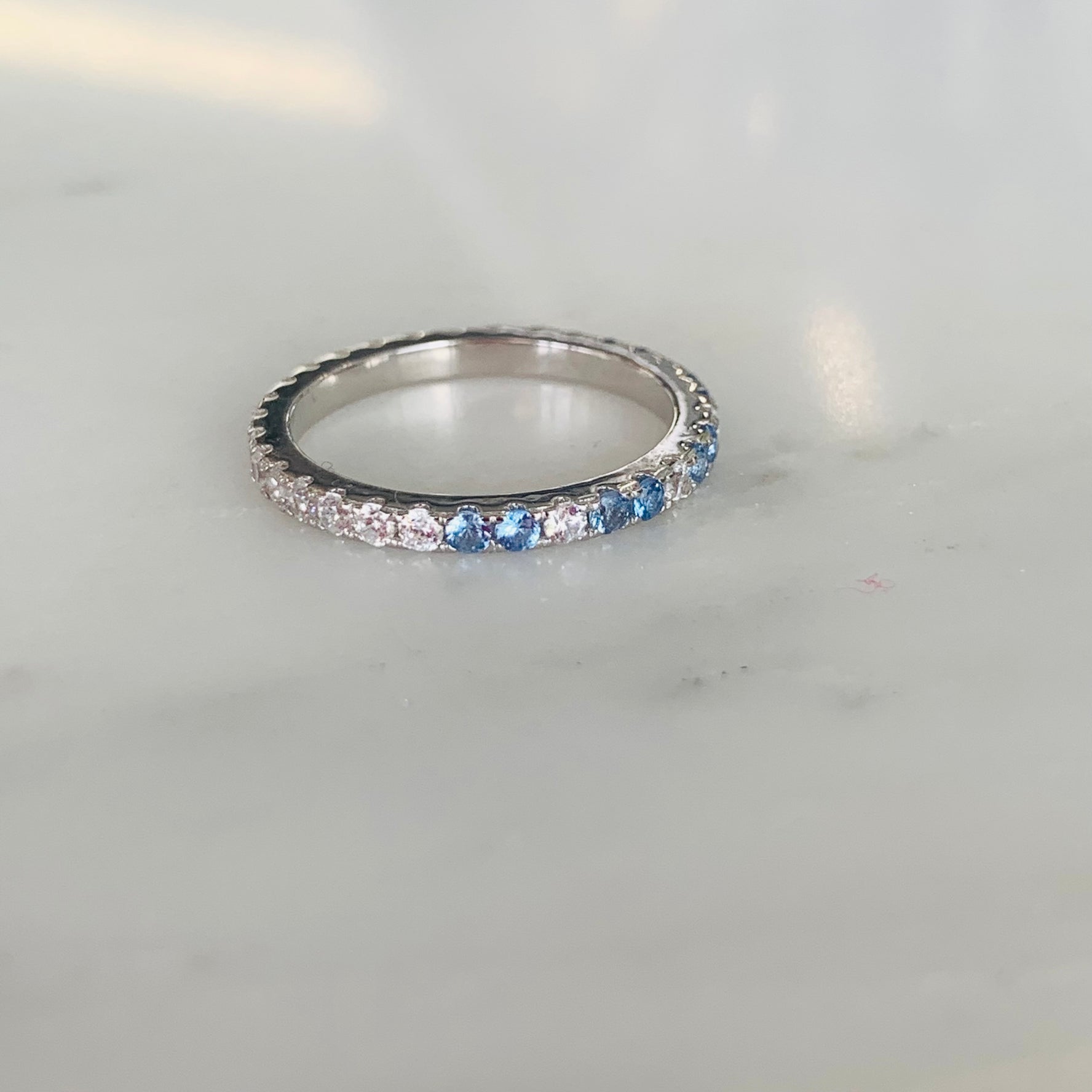 pave and blue duo ring